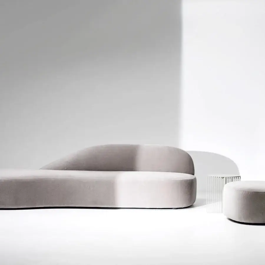 Distinguished LaCividina Guest lounge chair in light gray textile with matte finish presents essential lines and soft shapes