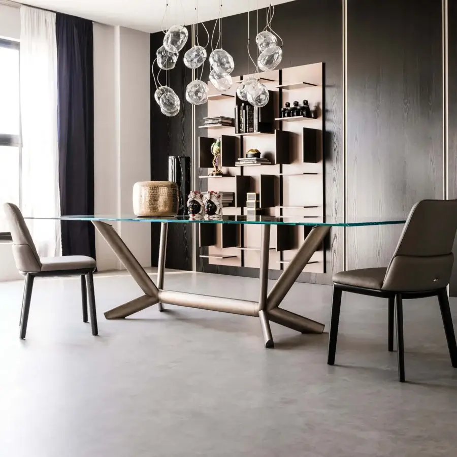 Elegant Cattelan Italia Planer table with a transparent glass top and satin finished steel base in muted gold or bronze tones