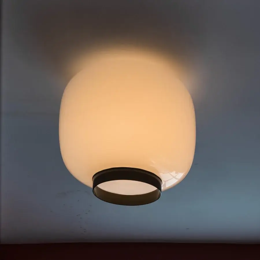 Exceptional Foscarini Chouchin Reverse ceiling lamp with hand-blown cased glass and glossy finish delivering warm white glow