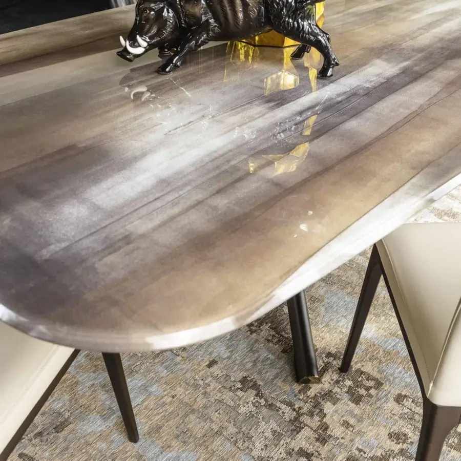 Exceptional Cattelan Italia Planer CrystalArt table with organically shaped glass and artistic brown, gray, beige print with dark metal legs