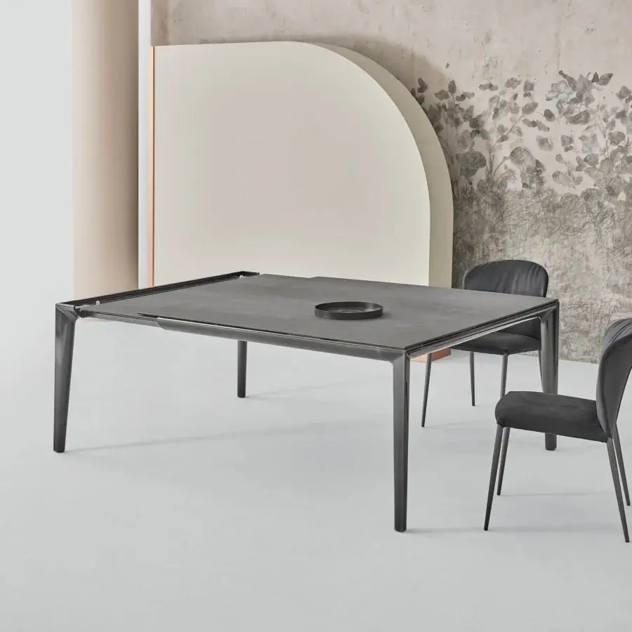 Superior Bontempi Duke Square table with gray matte tabletop and dark textile upholstered chairs built with slender metal legs
