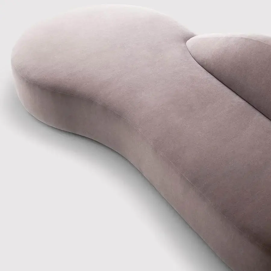 Elegant LaCividina Guest sectional with curved form upholstered in light gray-mauve and smooth finish