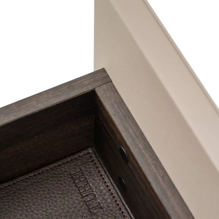 Sophisticated Turri Vendome dresser with Eucalyptus or walnut wood, refined metal details and dark leather drawer interiors in matte finish