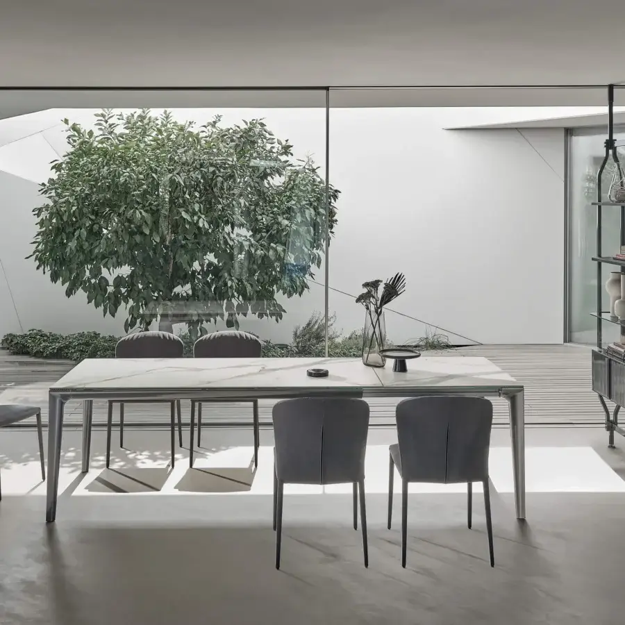 Elegant Bontempi Duke rectangular extendable table with white surface and grey veining in matte metal legs