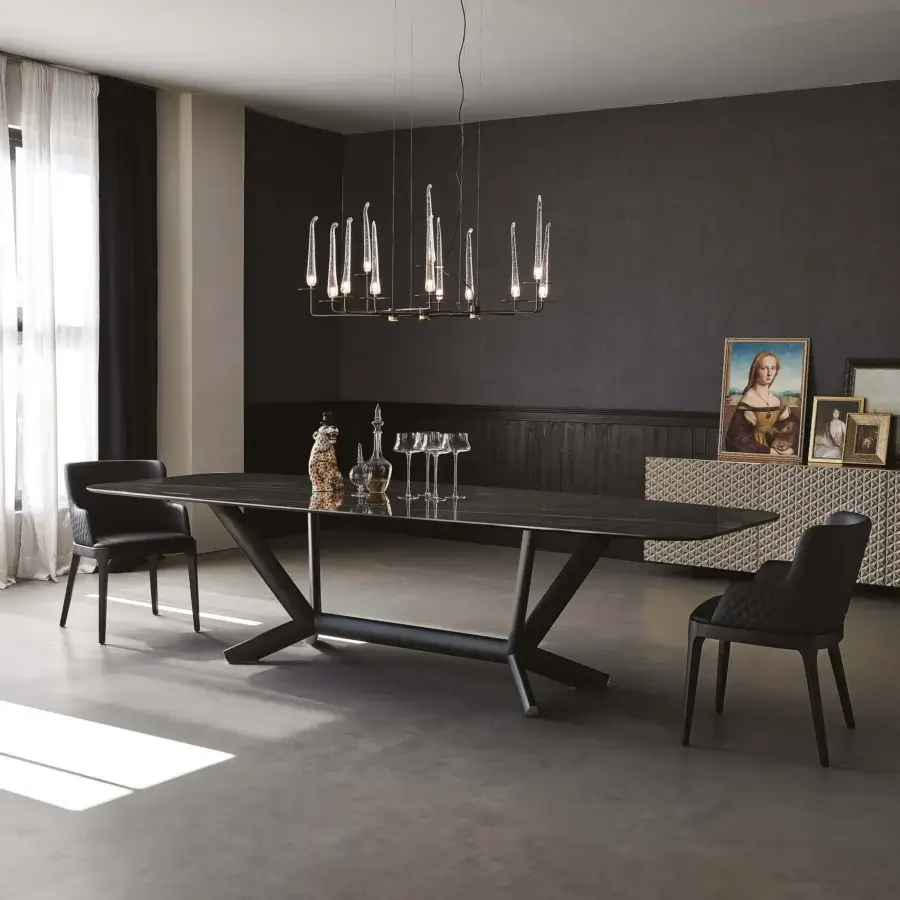 Sophisticated Cattelan Italia Planer table with rounded dark ceramic top and complex matte metal base