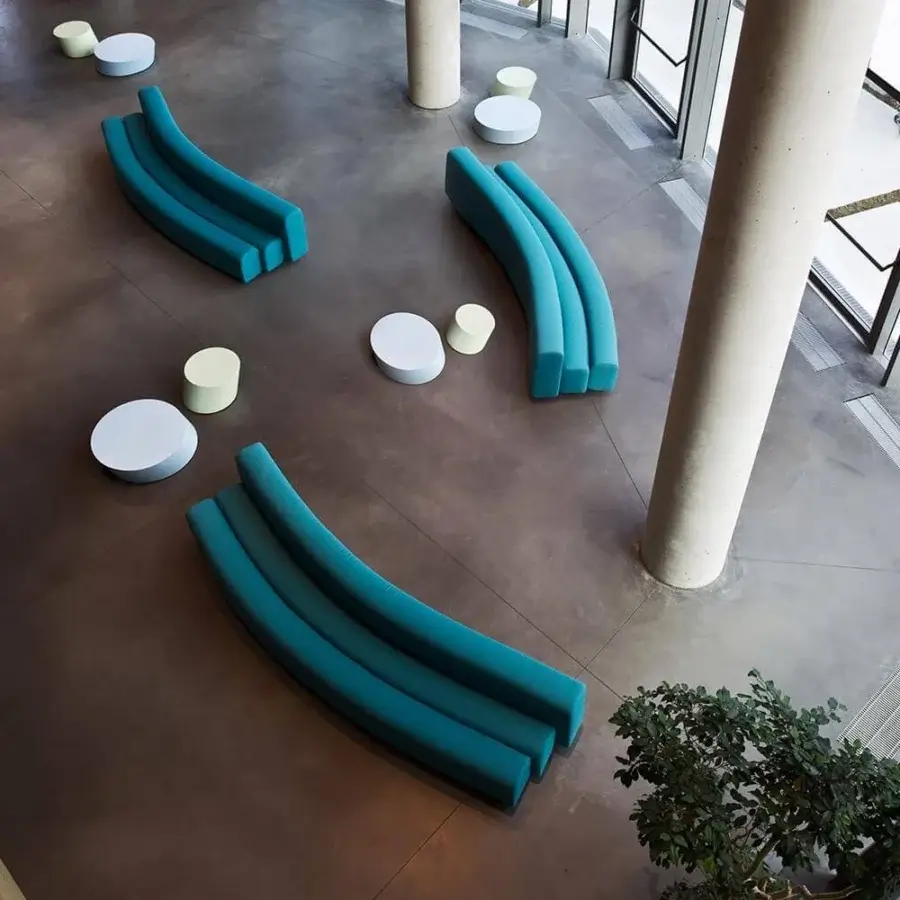 Exceptional LaCividina Osaka sofa with curved silhouette upholstered in smooth teal stretch fabric over a steel structure