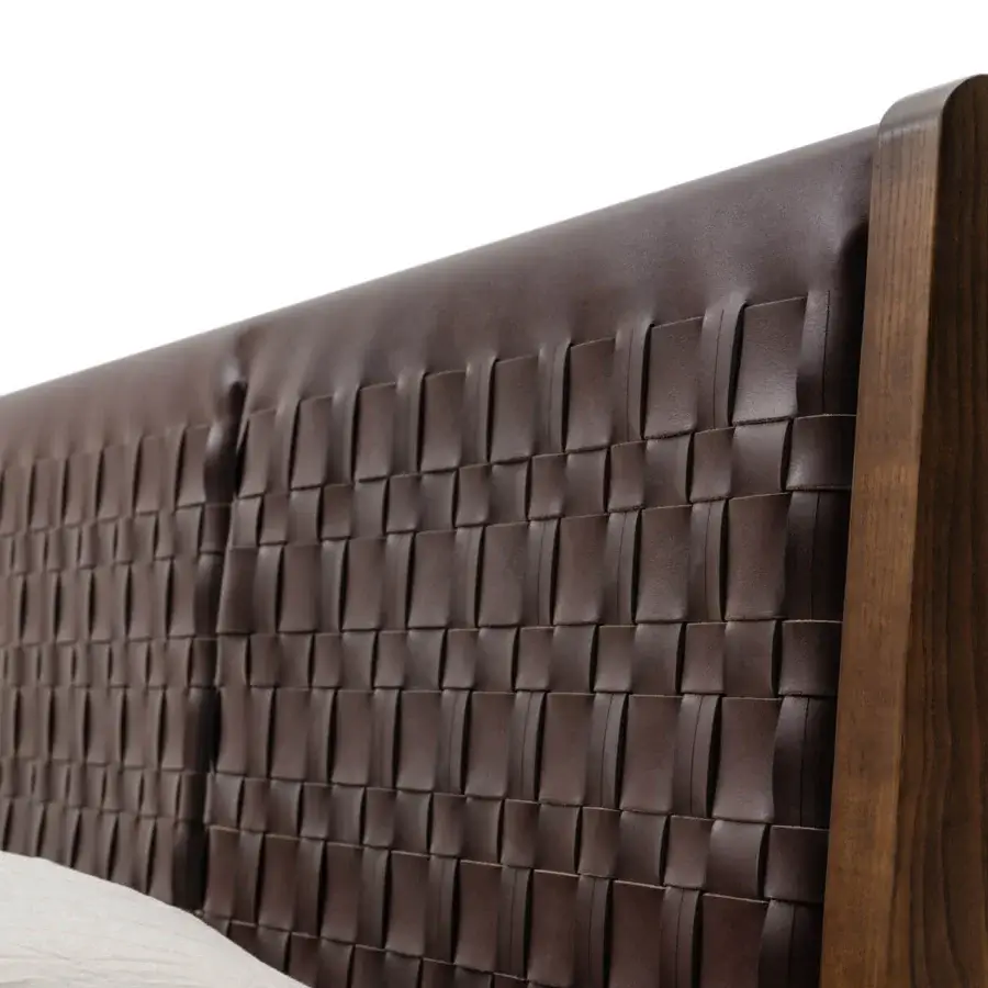 Exceptional Turri Net bed with woven dark brown saddle leather within a dark stained wood frame