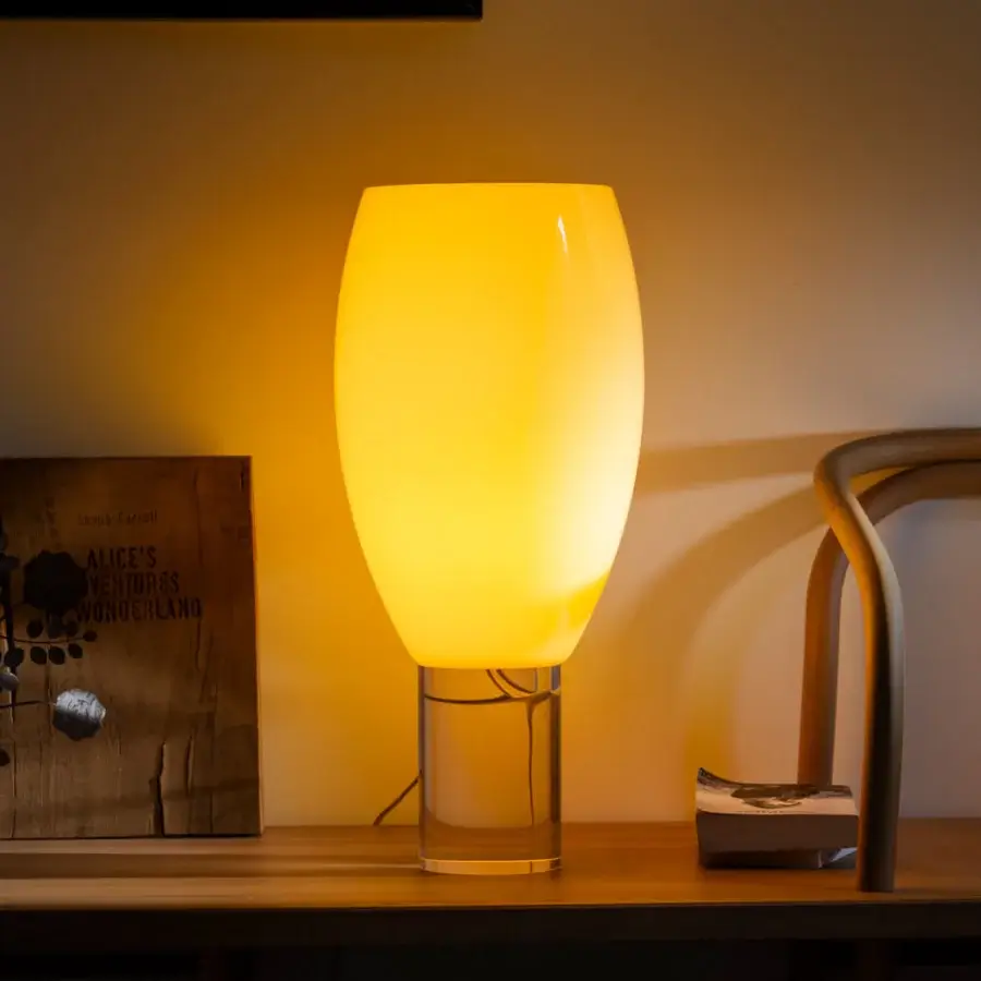 Superior Foscarini Buds lamp with elongated hand-blown cased glass diffuser and glossy finish in warm yellow light
