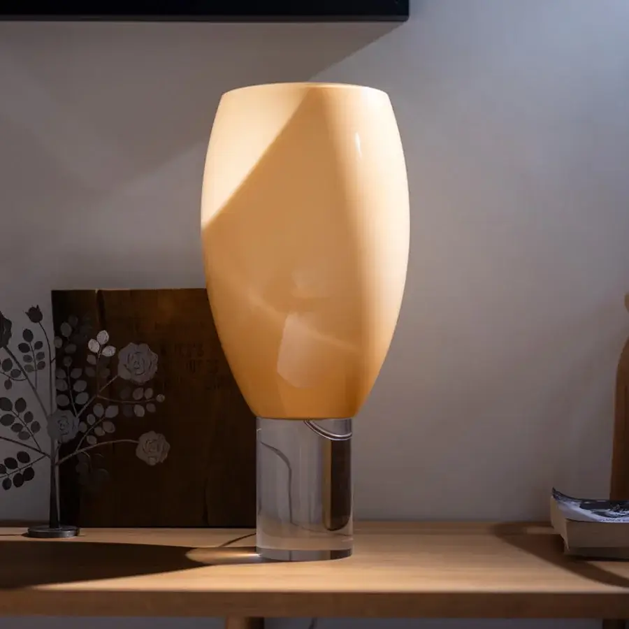Superior Foscarini Buds lamp with hand-blown cased glass diffuser and transparent PMMA base in light orange with glossy finish
