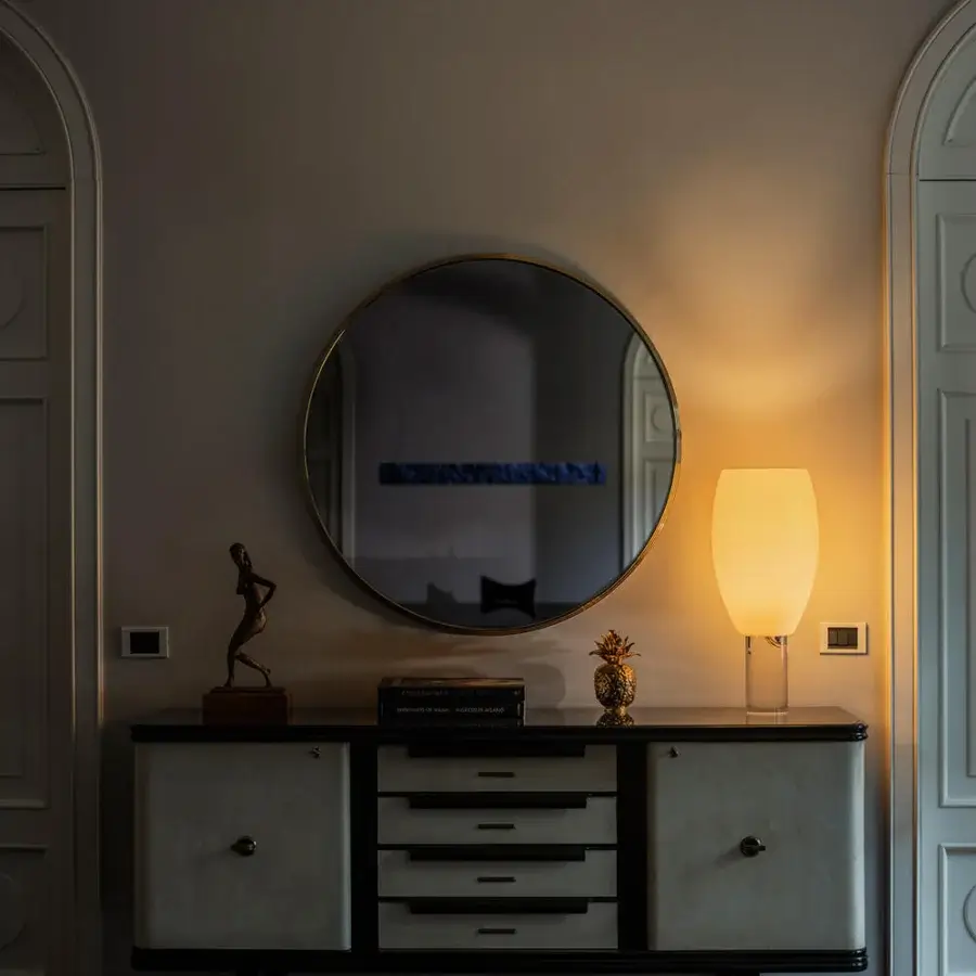 Elegant Foscarini Buds lamp with hand-blown cased glass lampshade and polished transparent PMMA cylindrical base