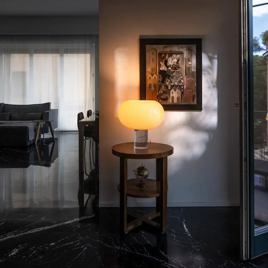 Superior Foscarini Buds lamp with hand-blown cased glass diffuser and transparent PMMA cylinder base crafted with a glossy finish