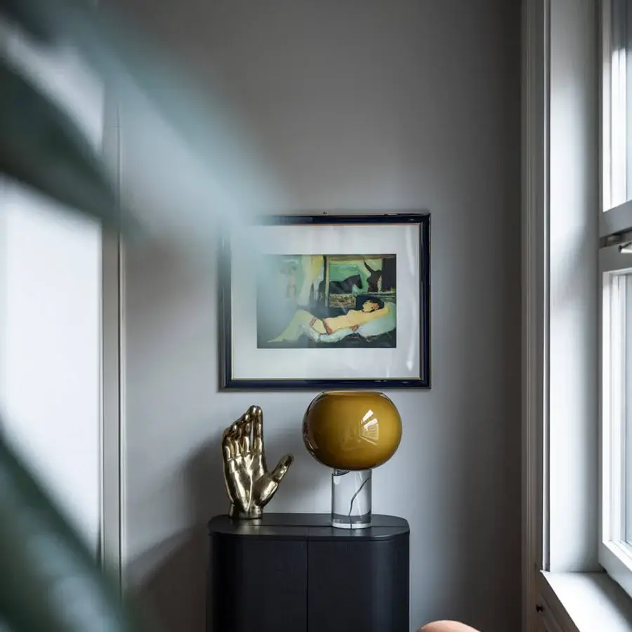 Exceptional Foscarini Buds lamp with hand-blown cased glass diffuser in golden-yellow and meticulously milled transparent PMMA base with mirror finish