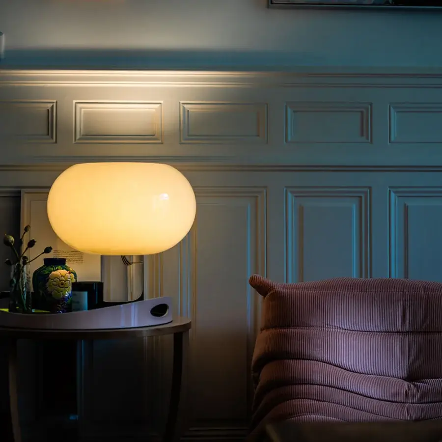 Distinguished Foscarini Buds lamp with hand-blown cased glass diffuser and transparent PMMA cylindrical base crafted in Italy