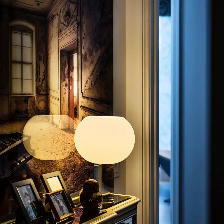 Exceptional Foscarini Buds lamp with hand-blown cased glass diffuser and glossy finish in white with transparent PMMA base