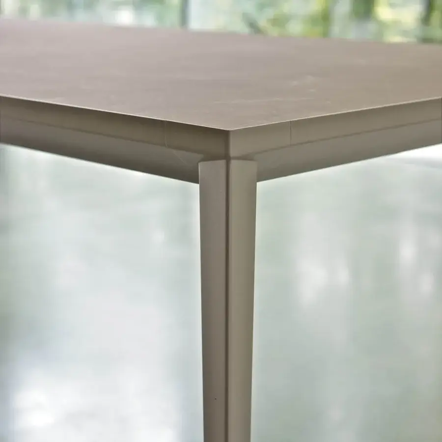 Superior Bontempi Echo extendable table with smooth matte surface and sleek legs in muted gray coloring