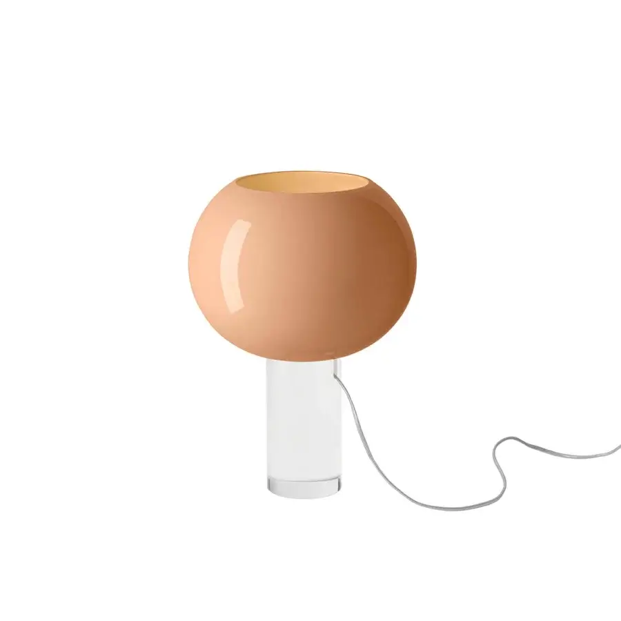 Foscarini Buds table lamp, pink acrylic, spherical shade with gold interior, clear cylindrical base, minimalist modern design.