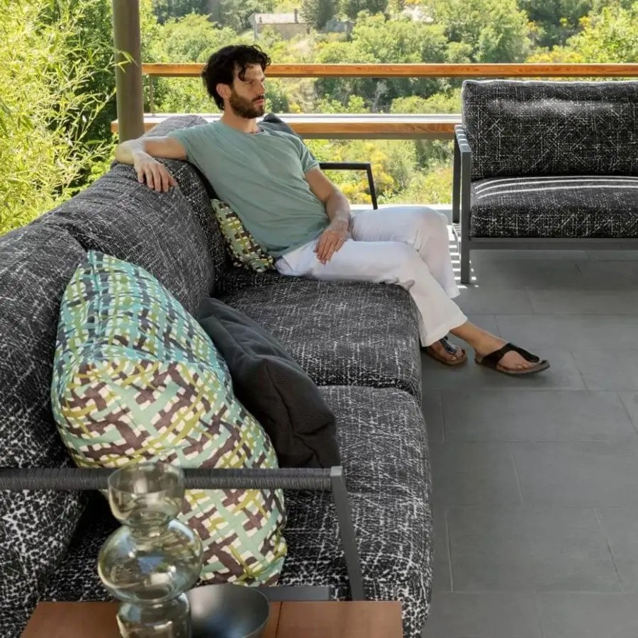 Superior Talenti Cottage sofa with geometric silhouette, plush mottled gray cushions and nautical rope detailing in aluminum