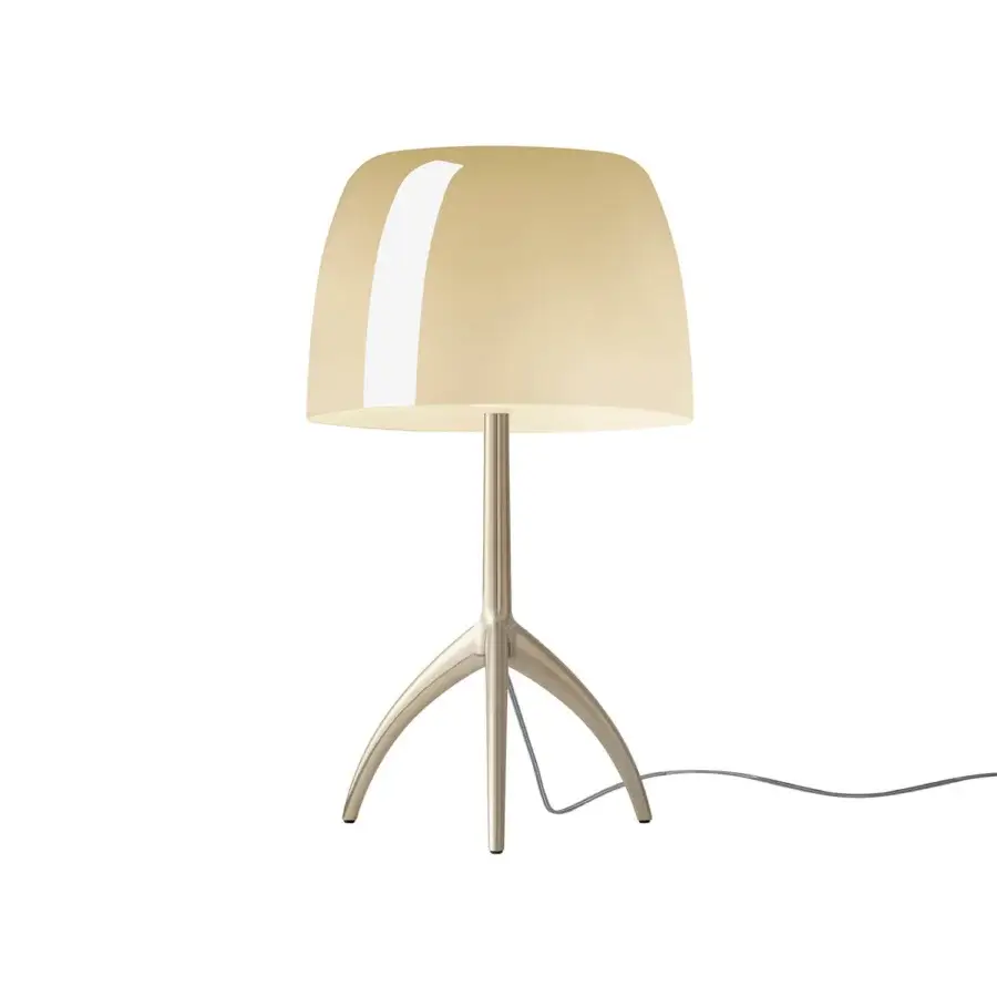 Foscarini Lumiere Grande table lamp, champagne white, rounded shade with interior light stripe and tripod aluminum base.