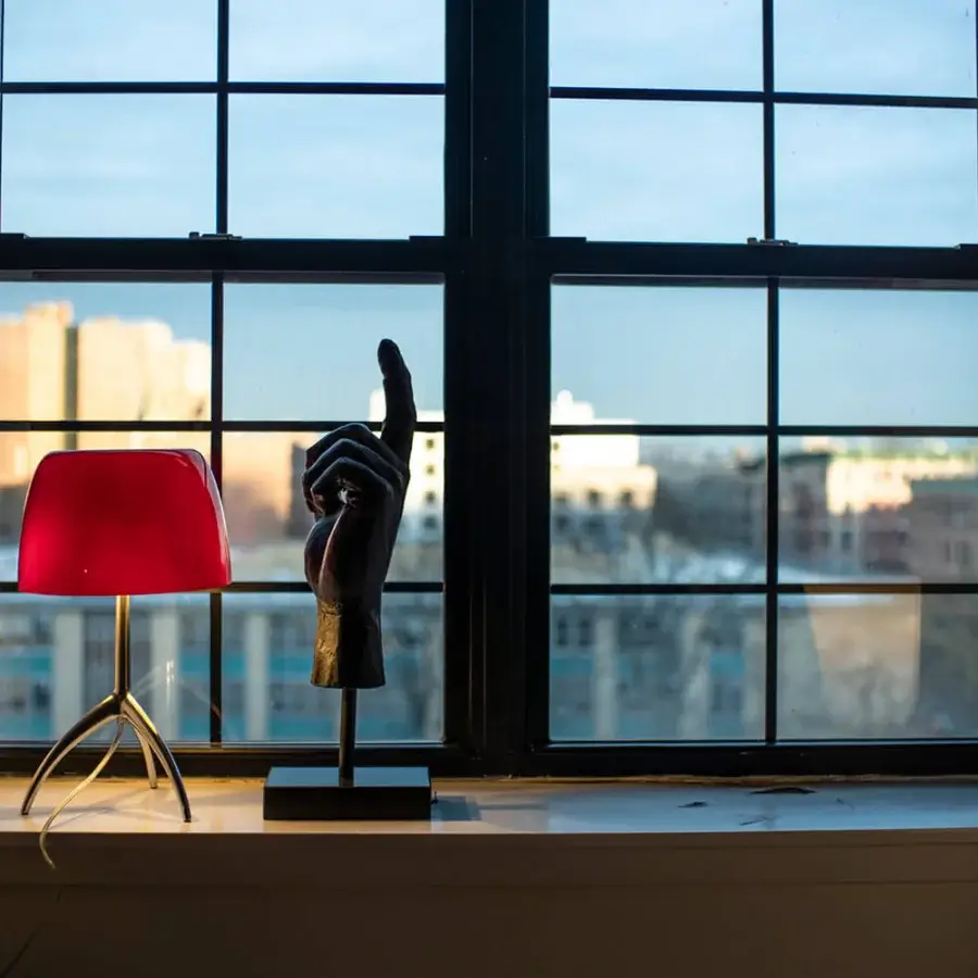 Superior Foscarini Lumiere table lamp with glossy cherry red cased glass diffuser and black chrome liquid painted aluminum base