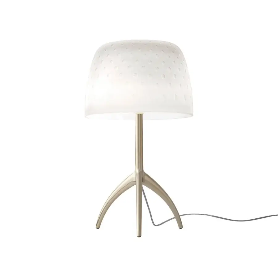 Foscarini Lumiere table lamp, white opaque shade, circular perforations, brushed metal tripod base, black cord, studio lighting.