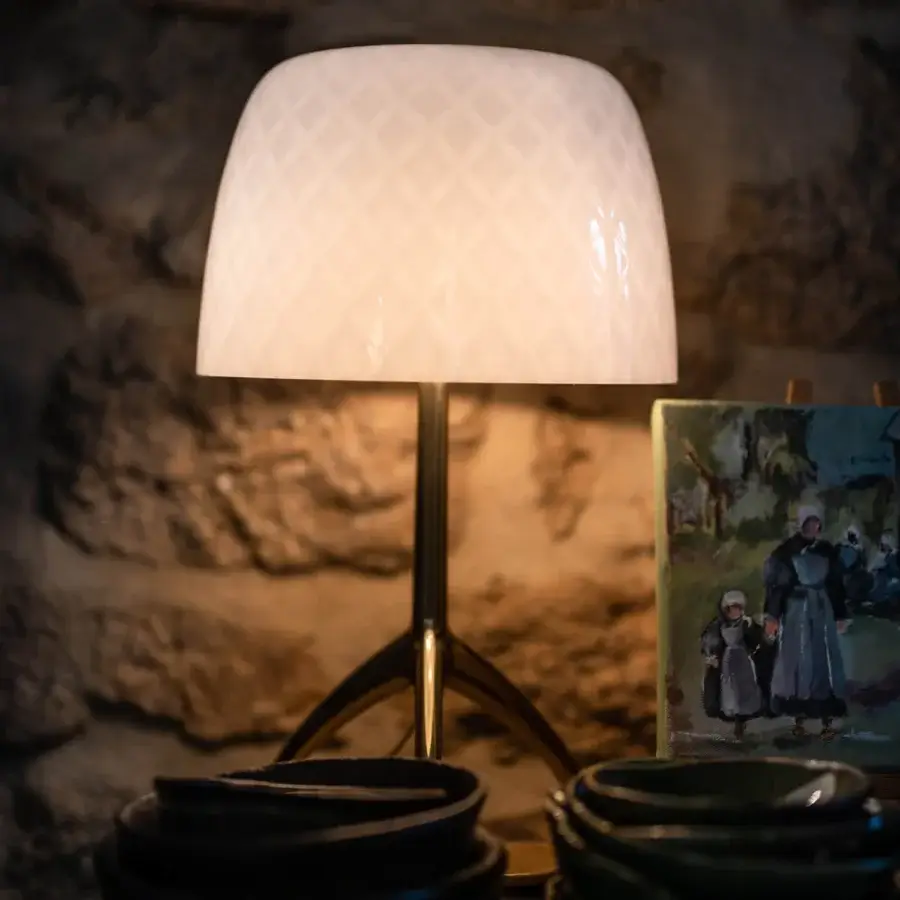 Exceptional Foscarini Lumiere table lamp with cased glass diffuser and liquid-coated die-cast aluminum tripod base