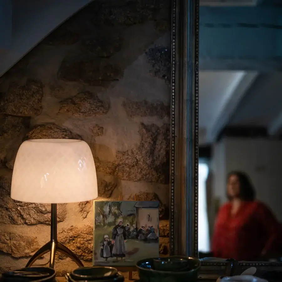 Elegant Foscarini Lumiere 30th lamp with glossy white cased glass diffuser and hand-finished liquid-coated aluminum base