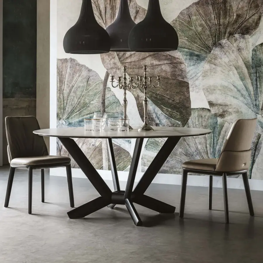 Captivating Cattelan Italia Planer table with light ceramic top and dark steel base exhibiting a matte finish