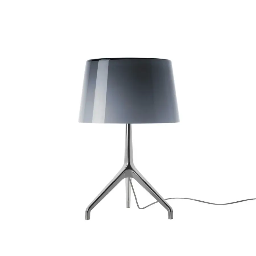 Foscarini Lumiere Table Lamp XXS in gray aluminum, cylindrical shade, tripod base, modern minimalist design, studio product shot.