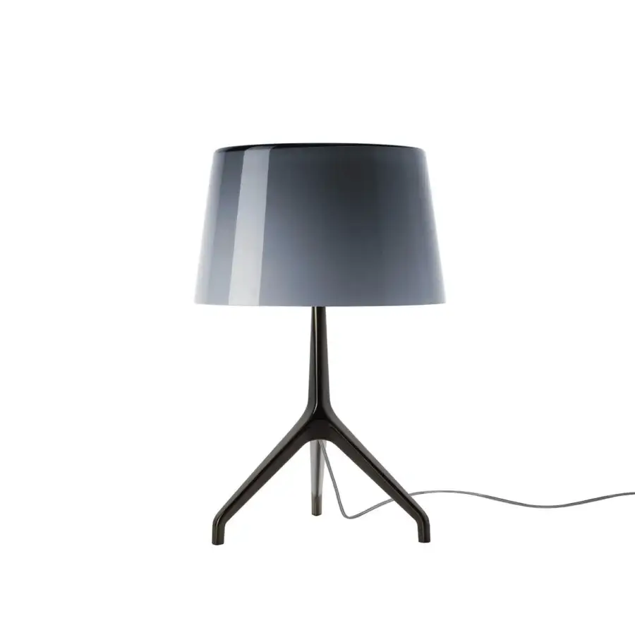 Foscarini Lumiere Table Lamp XXS in gray and black, cylindrical shade, tripod base, minimalist modern design, studio shot.