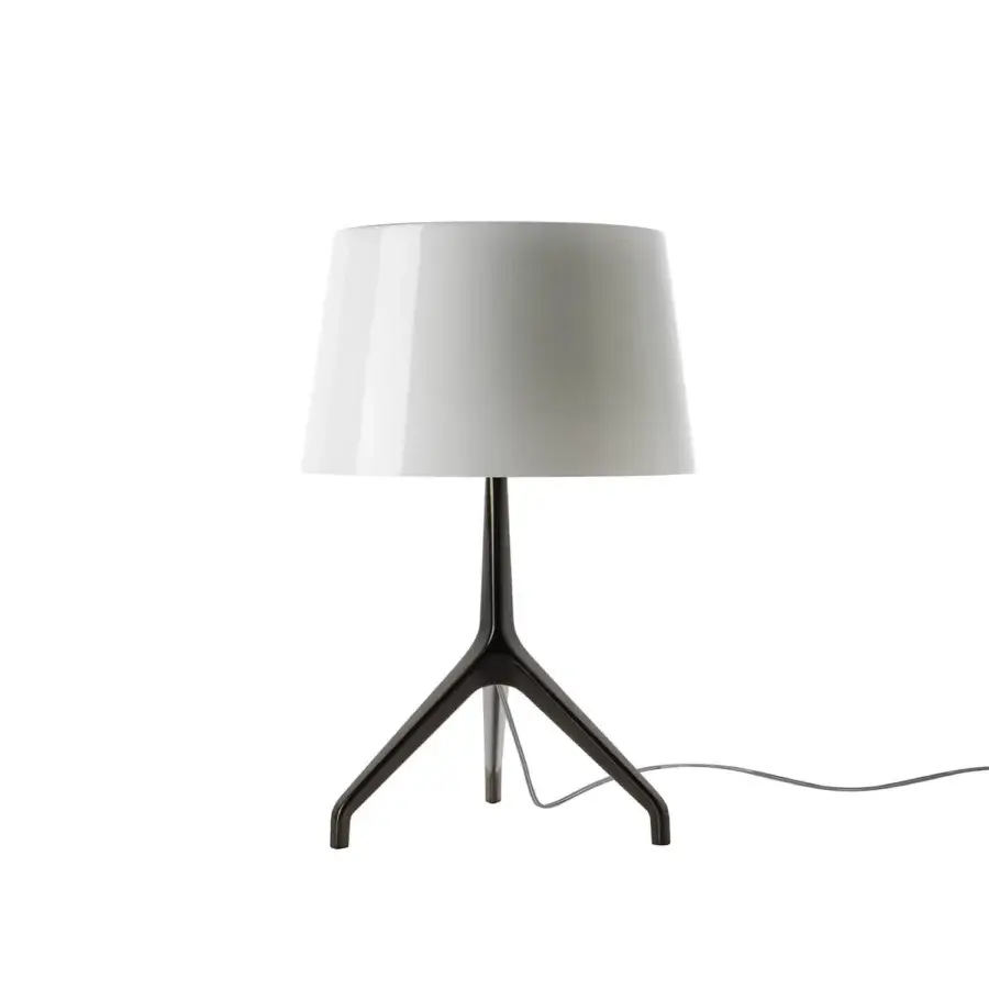 Foscarini Lumiere Table Lamp XXS, white and black, cylindrical shade with tapered form and three curved legs.