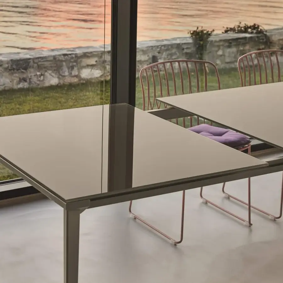 Superior Bontempi Echo table crafted in Italy with a glossy neutral gray-brown glass top and matching metal frame