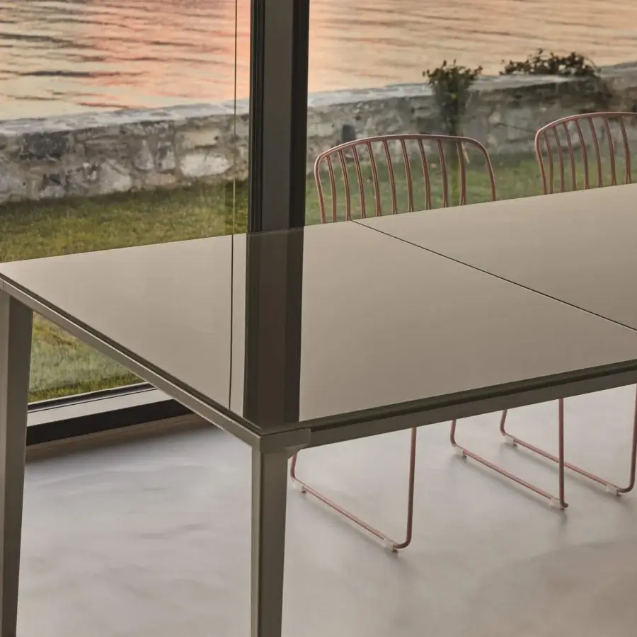 Distinguished Bontempi Echo extendable table with glossy gray glass tabletop and sleek matte metal legs