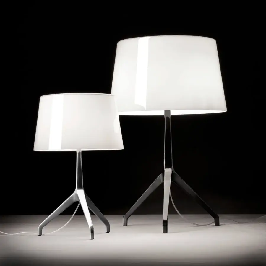 Exceptional Foscarini Lumiere lamp with glossy white hand-blown cased glass and polished die-cast aluminum base