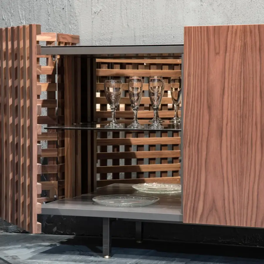Distinguished Pacini & Cappellini Aurora sideboard with solid wood and graphite metal base, showcasing clear glass shelves and a matte finish