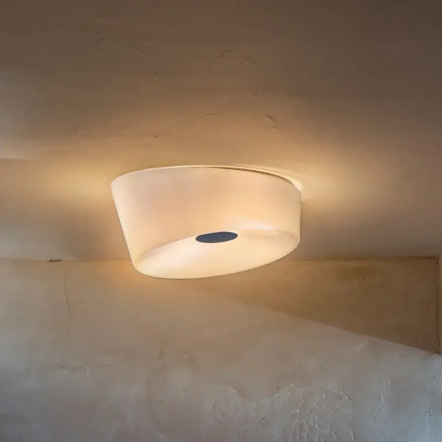 Exceptional Foscarini Lumiere ceiling lamp with hand-blown cased glass diffuser and glossy metal mount