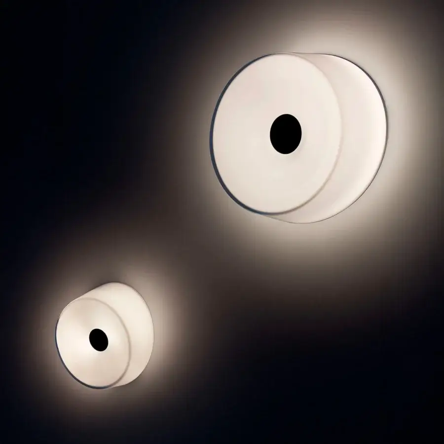 Exceptional Foscarini Lumiere wall lamp with hand-blown cased glass diffuser and glossy white finish