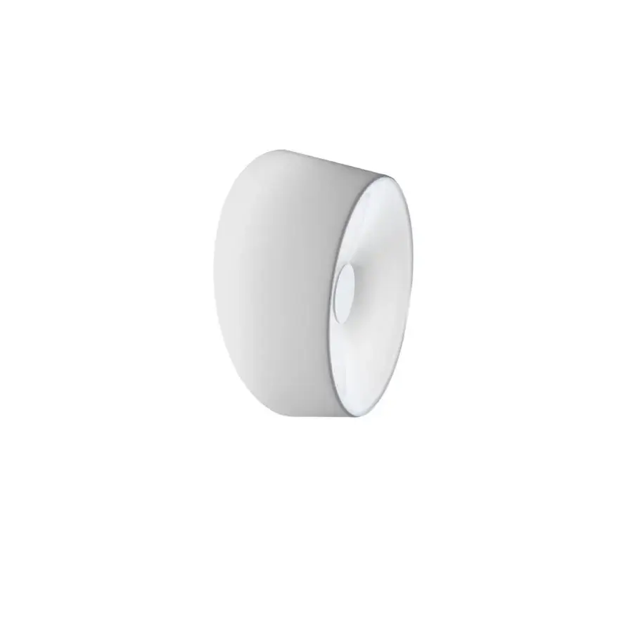 Foscarini Lumiere Wall Lamp B White, cylindrical matte white lamp with concave reflector, studio product shot.