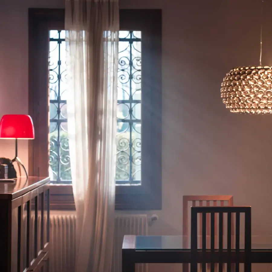Distinguished Foscarini Caboche Plus suspension lamp with transparent PMMA spheres and a die-cast aluminum base crafted in Italy