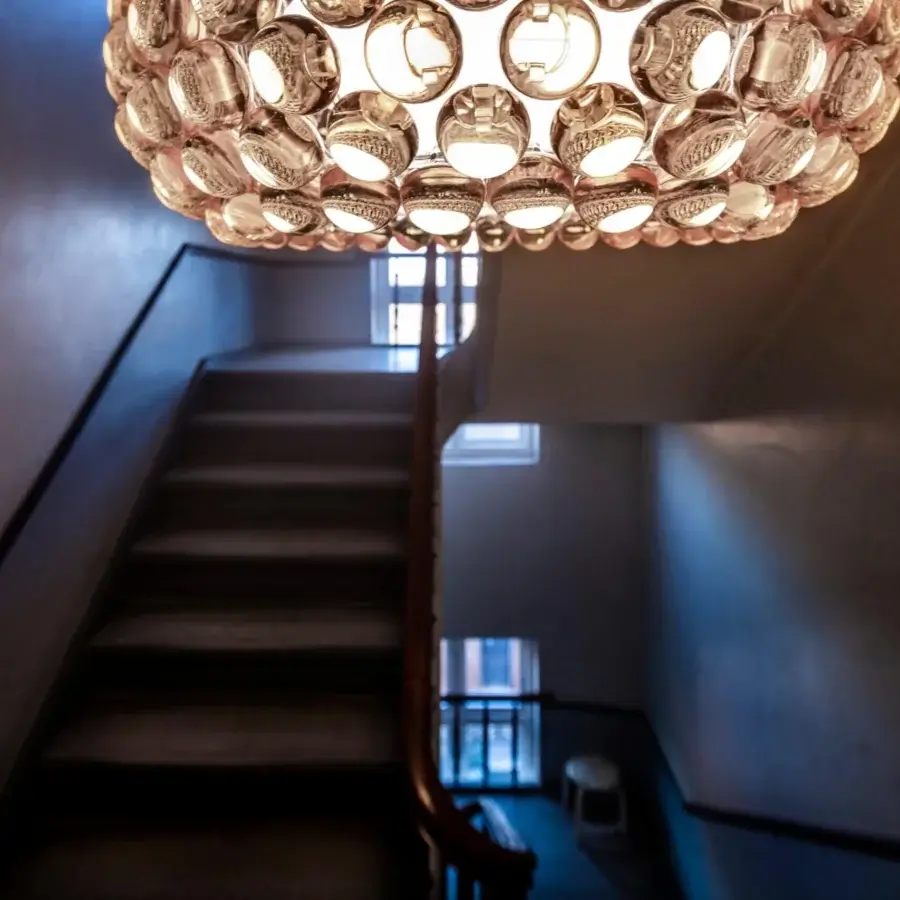 Distinguished Foscarini Caboche Plus suspension lamp with numerous transparent PMMA spheres and a satin finish PMMA diffuser crafted in Italy