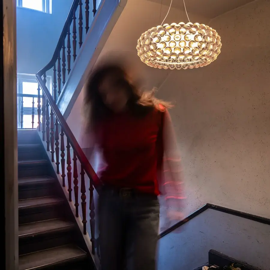 Distinguished Foscarini Caboche Plus suspension lamp with transparent PC arches and clear PMMA spheres crafted using a twist-lock system