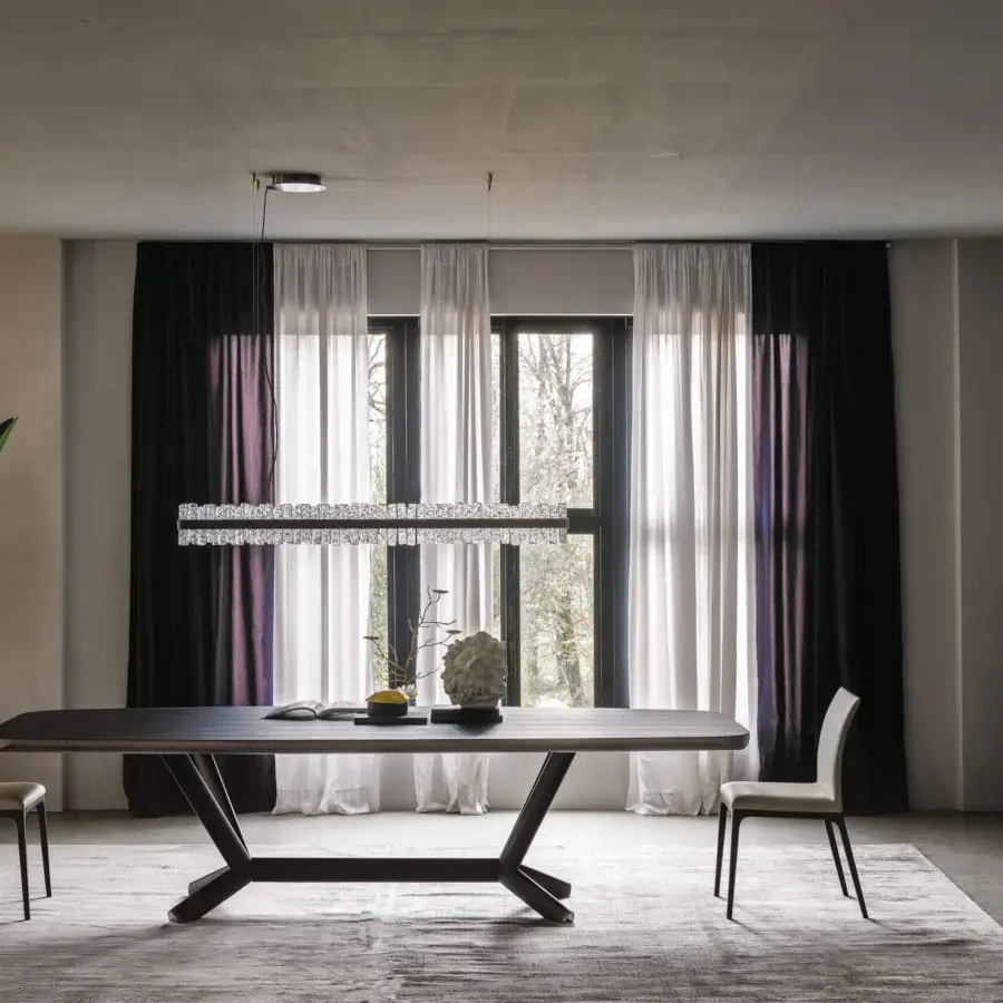 Distinguished Cattelan Italia Planer Wood table with a barrel top and angled edges in matte finish wood