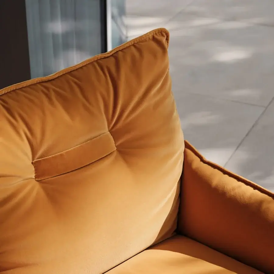 Distinguished Turri Silhouette lounge chair crafted in Italy with inviting mustard-colored velvet upholstery and unique upside-down frame