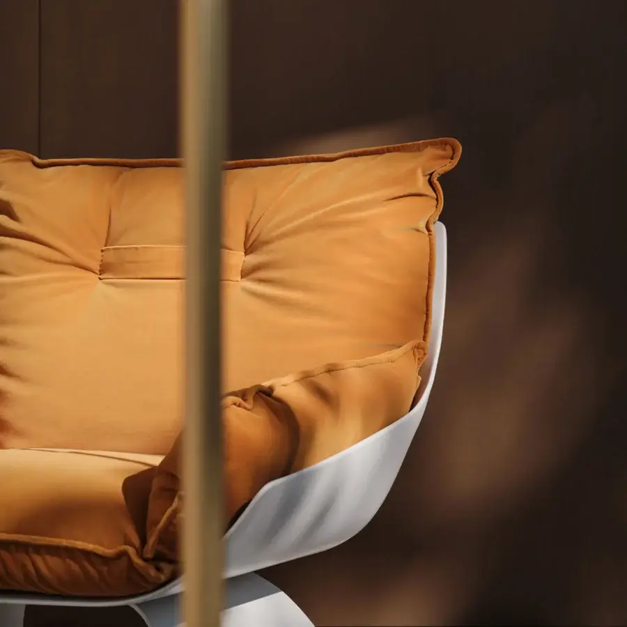 Lavish Turri Silhouette lounge chair with stark white frame and plush golden-yellow velvet upholstery crafted in Italy