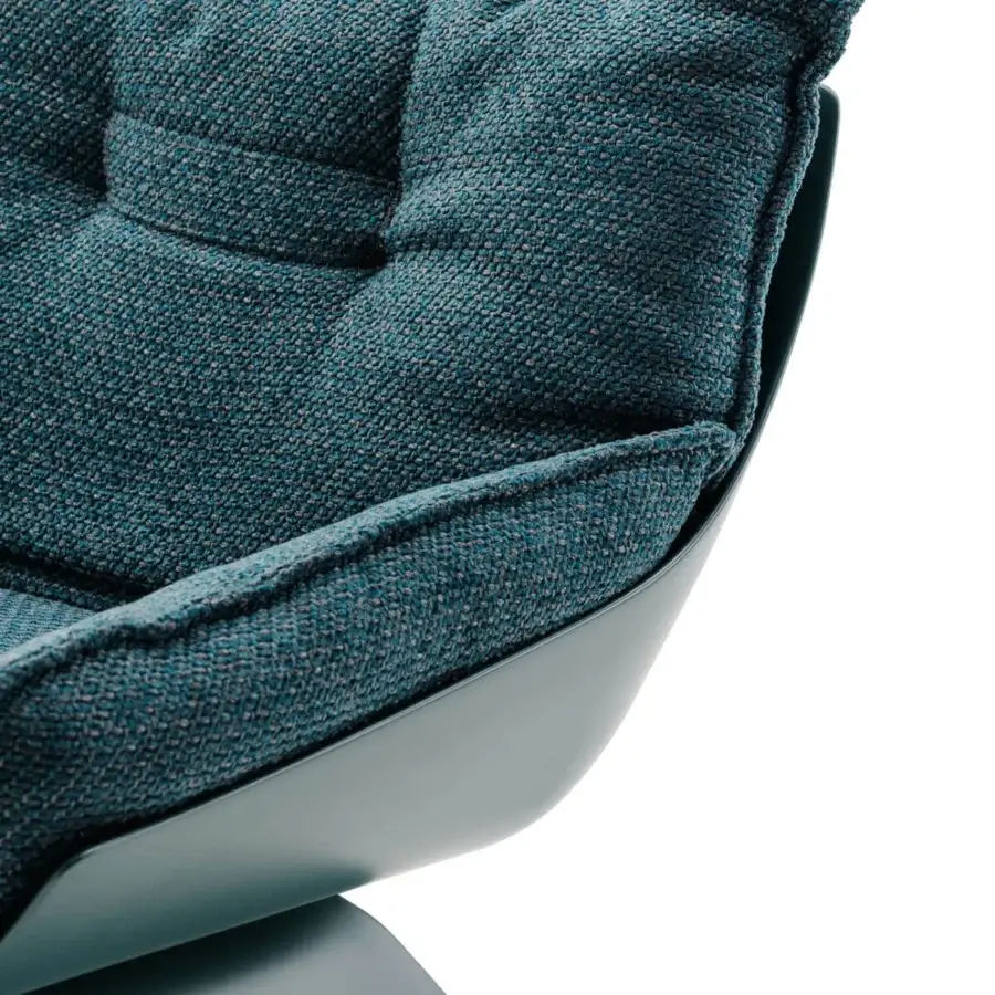 Exceptional Turri Silhouette lounge chair with teal textile upholstery and matte-finished shell crafted in Italy