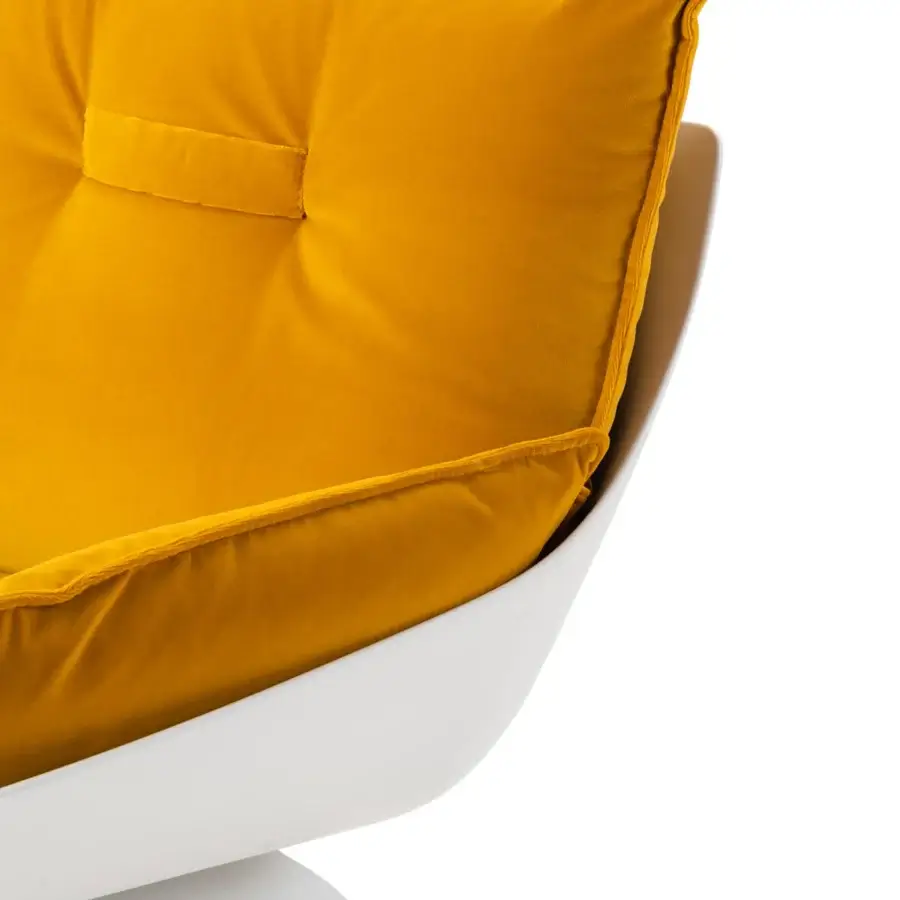 Elegant Turri Silhouette lounge chair with plush mustard-yellow textile and smooth white frame