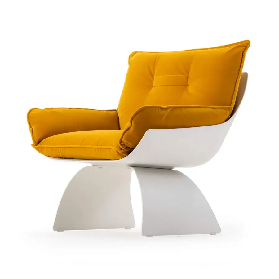 Superior Turri Silhouette lounge chair with crisp white shell and plush mustard-yellow textile cushions