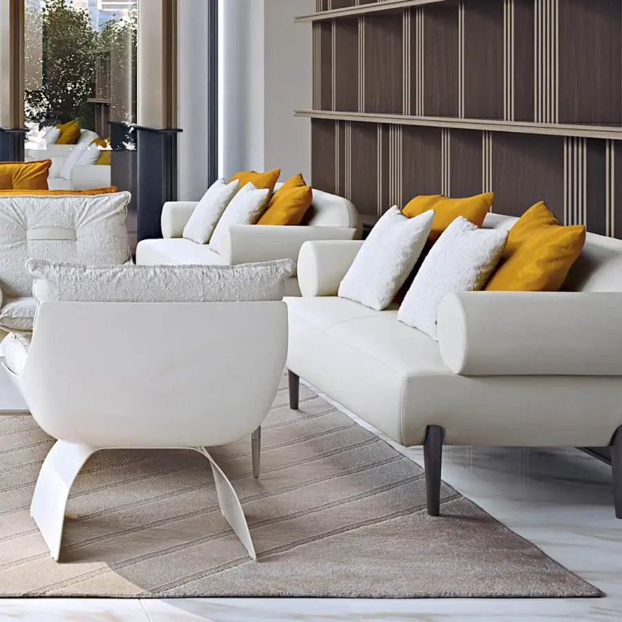 Exceptional Turri Silhouette sofa with curved form and plush cushions in light off-white synthetic leather with dark cylindrical legs