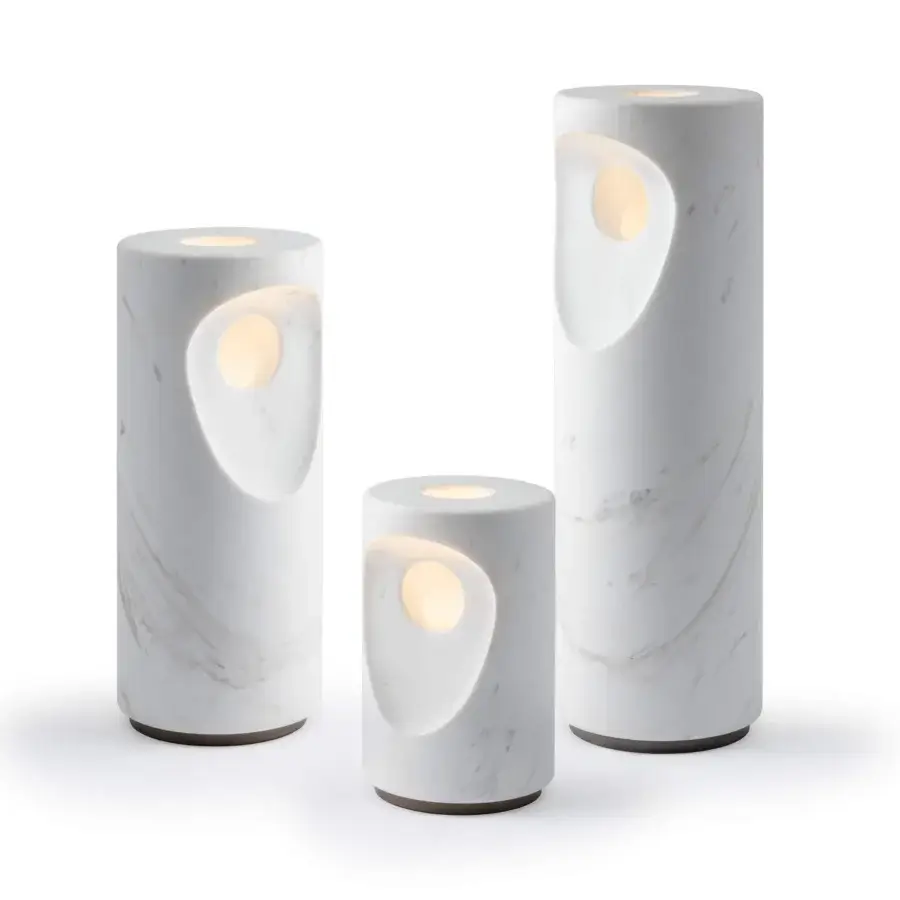 Distinguished Turri Silhouette table lamp with cylindrical body crafted in white marble and varnished metal base emitting diffused light