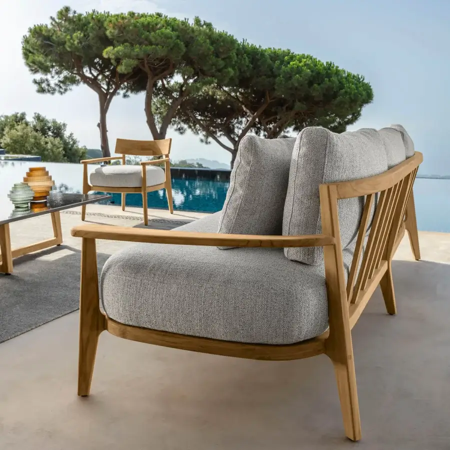 Elegant Talenti Ever sofa with plush grey cushions and a light natural-toned wood frame construction