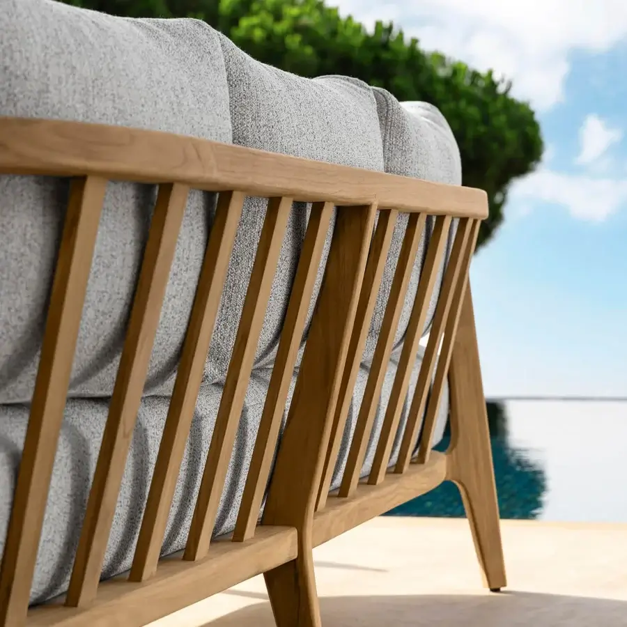 Distinguished Talenti Ever sofa with comfortable light gray cushions and warm-toned wooden frame crafted in Italy